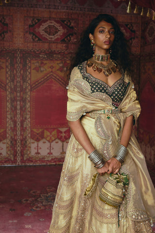 Gold and dark green pure tissue lehenga set