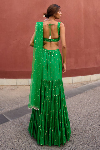 Aisha Green Tiered Lehenga Set by Chamee And Palak, available on Indiaspopup.com