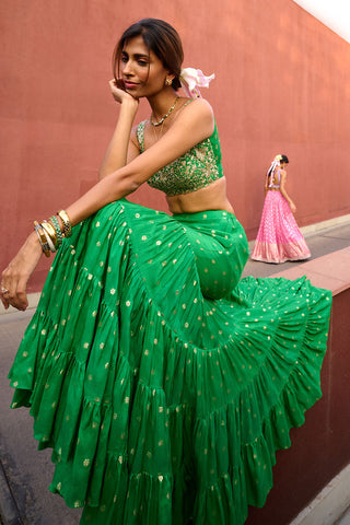 Aisha Green Tiered Lehenga Set by Chamee And Palak, available on Indiaspopup.com