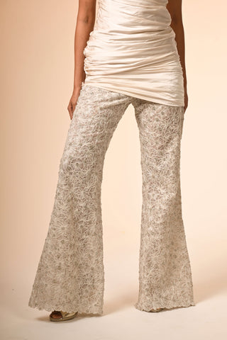 Ivory asymmetric pleated top and cutwork pants