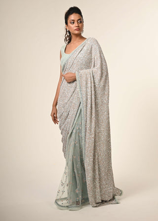 Powder blue embroidered sari and blouse