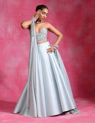 Icy blue corset lehenga set with cape