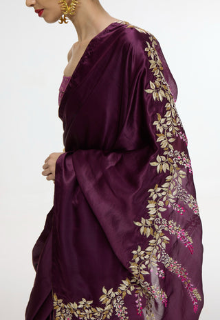Handwoven maroon sari with embroidered panel