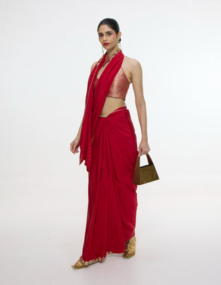 Vermillion sari with gold button detailing
