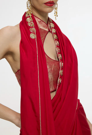 Vermillion sari with gold button detailing