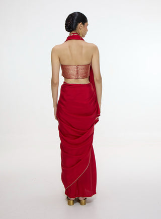 Vermillion sari with gold button detailing