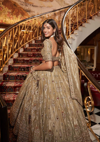 Firdous gold lehenga set