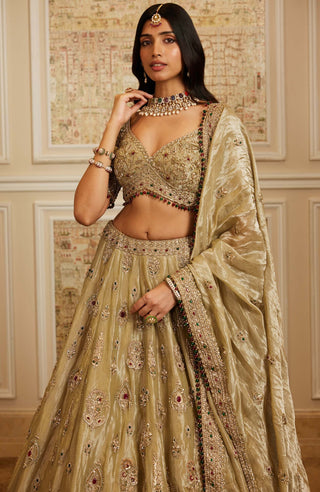 Firdous gold lehenga set