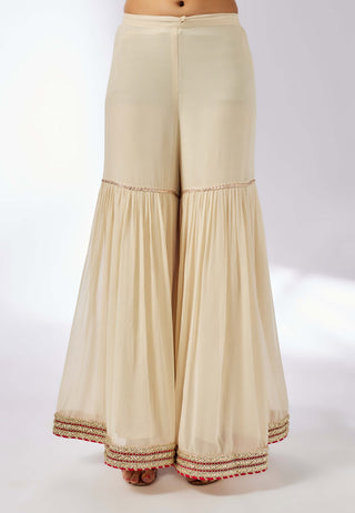 Chhaya Ivory Strappy Sharara Set by Gopi Vaid, available on Indiaspopup.com