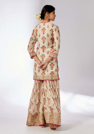 Prachi Ivory Peplum Sharara Set by Gopi Vaid, available on Indiaspopup.com