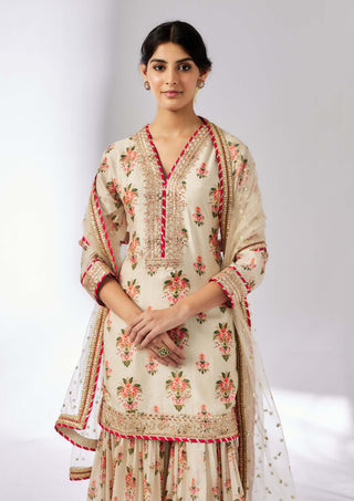 Prachi Ivory Peplum Sharara Set by Gopi Vaid, available on Indiaspopup.com