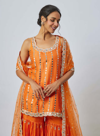 Hrida Orange Sharara Set by Gopi Vaid available on Indiaspopup