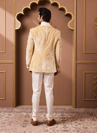 Gold velvet tuxedo and cream pant