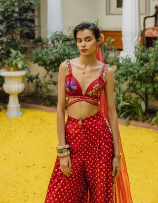 Red embroidered bralette and pleated trouser set