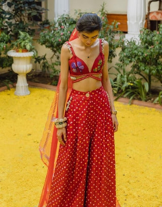 Red embroidered bralette and pleated trouser set