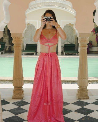 Pink silk bralette and bandhani trousers