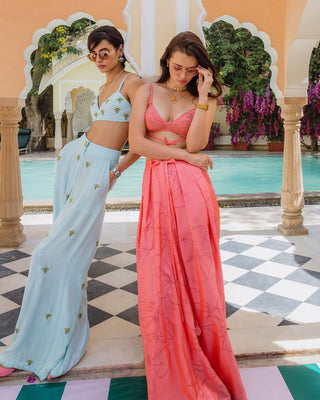 Pink silk bralette and bandhani trousers