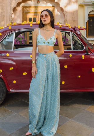 Blue bralette, bandhani trousers and jacket