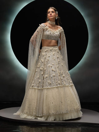 Veilora ivory  lehenga and organza bustier