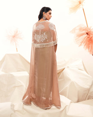 Sage corset, draped skirt and pink cape