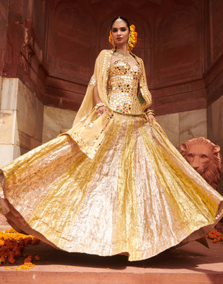 Chandi Sona Sheesh Lampi Lehenga And Cape Set by Itrh available on Indiaspopup.com