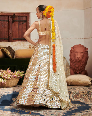 Sheesh Mahal Gold Lehenga Set by Itrh available on Indiaspopup.com