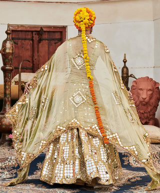 Chand Aayna Gold Lehenga Set by Itrh available on Indiaspopup.com