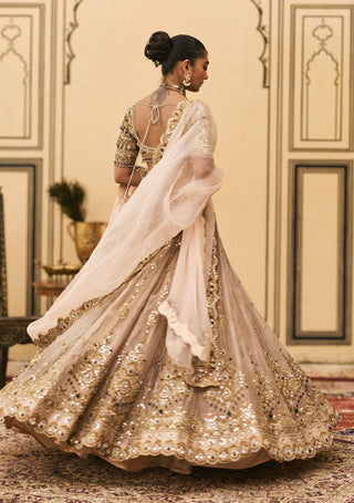 Maang tika golden bridal lehenga set