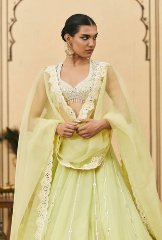 Mint green draped organza lehenga set