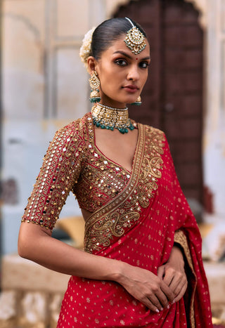 Red surangana sari and blouse