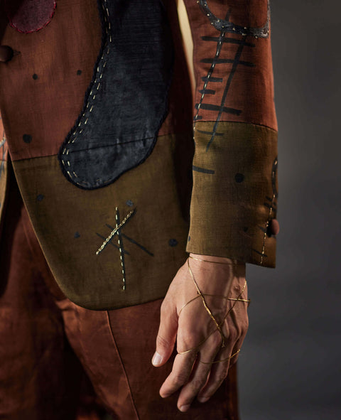 Olive brown blazer and trousers