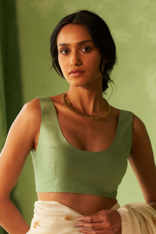 Off-white chanderi sari and tea green blouse