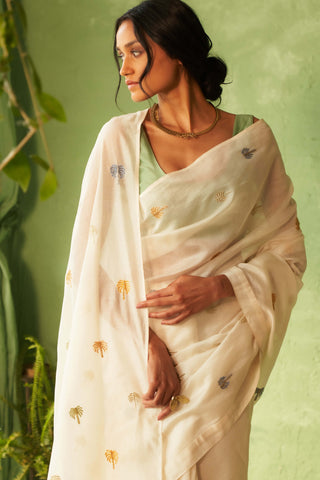 Off-white chanderi sari and tea green blouse