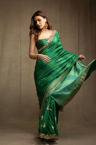 Mystic green sari and unstitched blouse