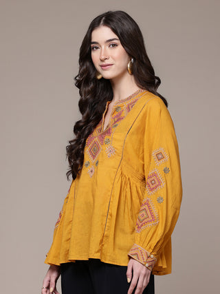 Mustard solid full sleeves a-line kurti