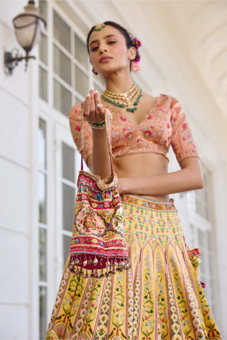 Nehmat yellow lehenga set