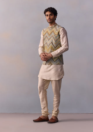 Sehej Beige Kurta And Green Bundi Set by Kalista Men available on Indiaspopup.com