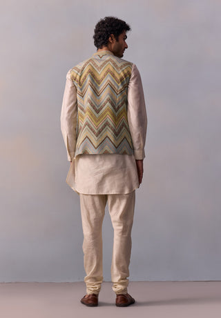 Sehej Beige Kurta And Green Bundi Set by Kalista Men available on Indiaspopup.com