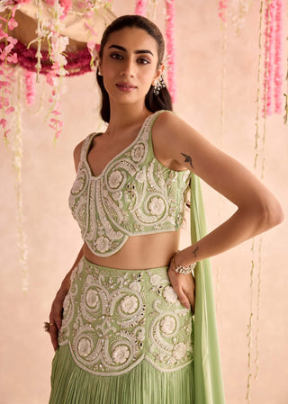 Mint green choli with attached dupatta and lehenga