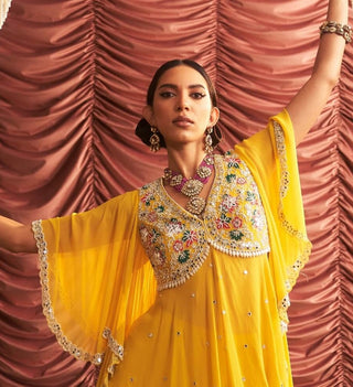 Jyoti yellow embellished peplum and gharara pants