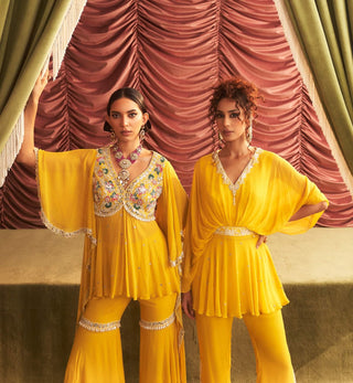 Jyoti yellow embellished peplum and gharara pants