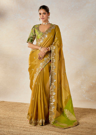 Gold son barfi sari and unstitched blouse