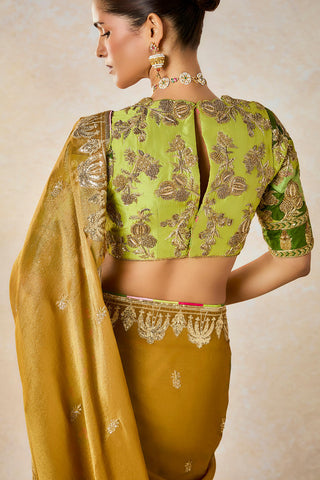 Gold son barfi sari and unstitched blouse