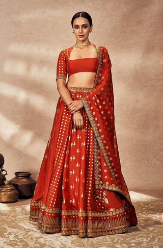 Rust Foil Lehenga Set by House Of Masaba, available on Indiaspopup.com