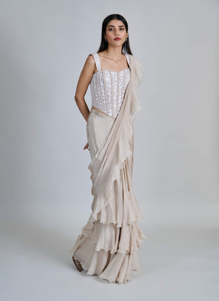 Champagne ivory ruffle sari and corset.