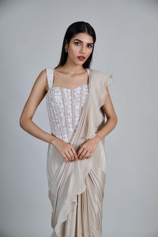 Champagne ivory ruffle sari and corset.