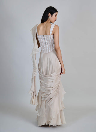 Champagne ivory ruffle sari and corset.