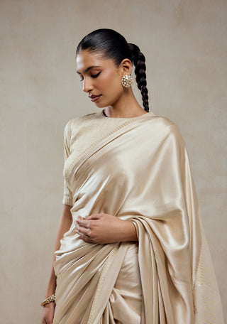 Ivory monga tissue gold striped sari and blouse