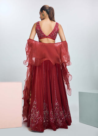 Intense Rust Embroidered Lehenga Set by Nirmooha available on Indiaspopup.com