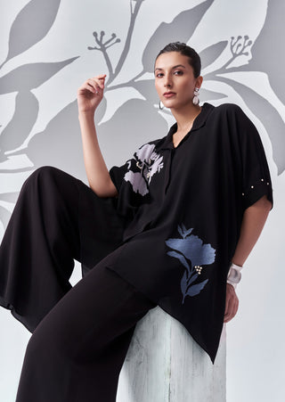 Black memento poncho top and pants